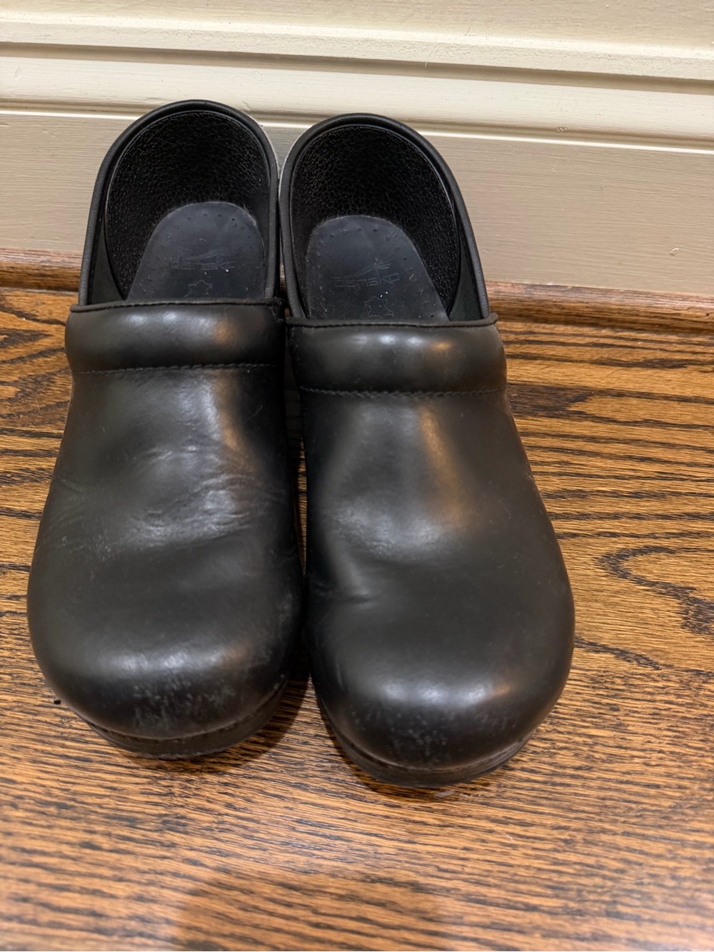 Dansko Black Leather Slip-On Clogs